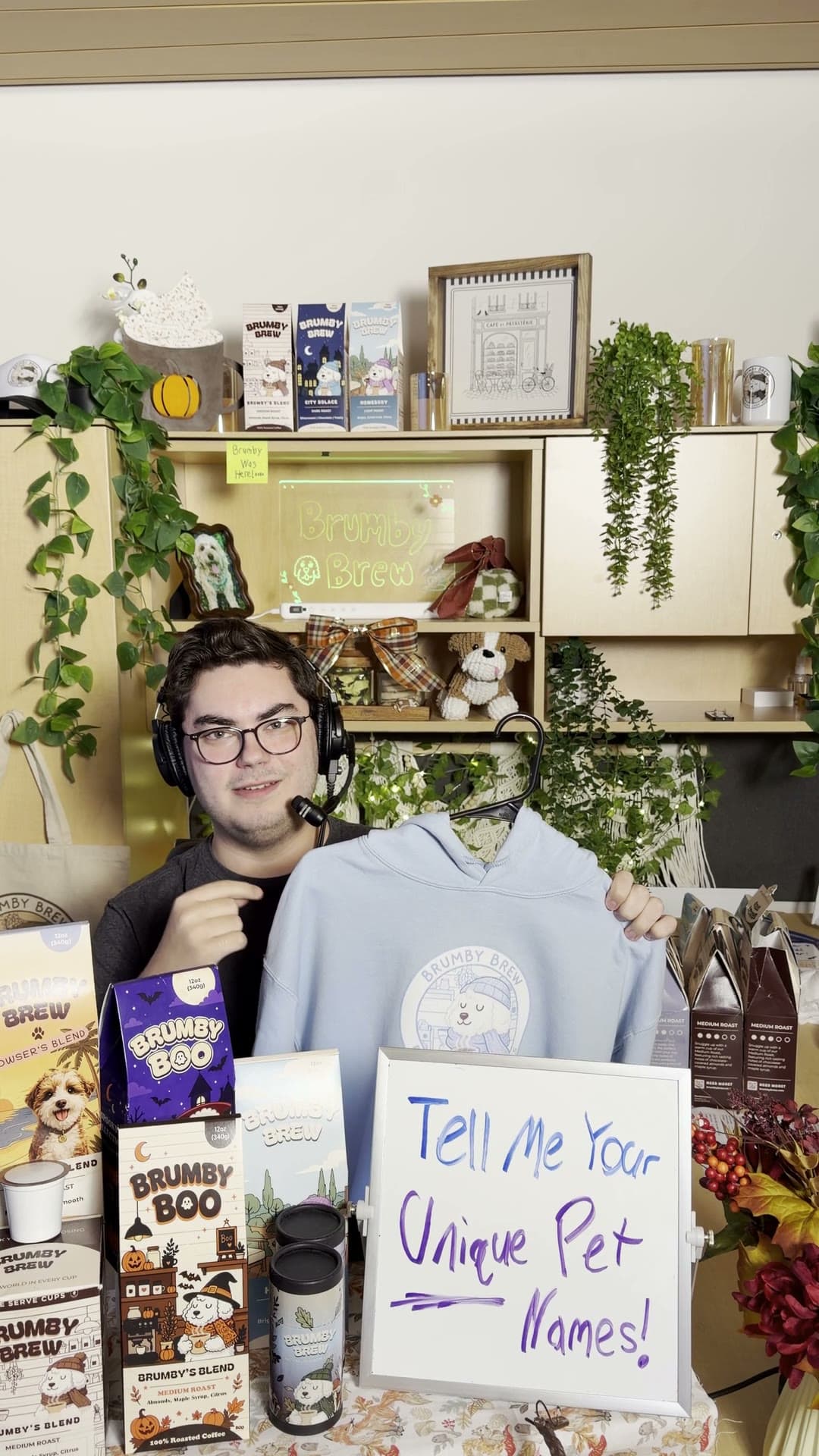 A LIVE host on the coffee set holding a sweatshirt